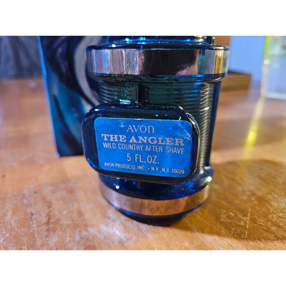 Vintage Avon The Angler Cologne Blue Fishing Reel Bottle FULL bottle. 1618